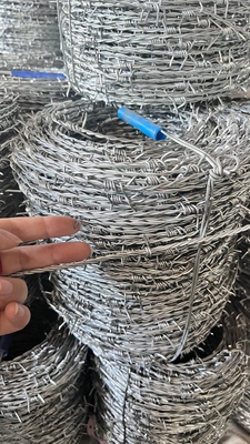 колючая проволока охранный забор охранная колючая проволока лезвие колючая проволока колючая проволока оцинкованная колючая проволока ферма ограждение колючая проволока колючая проволока роллы для скота